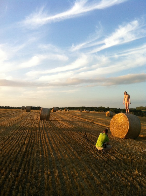 Behind the scenes shot of Thomas Holm Photographer, and Lisa Christiansen, Model  in a field