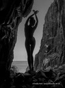 Model Mette Munkø Silhouette in a cave near a mountainTH2013-1128. Foto/Photo: Thomas Holm